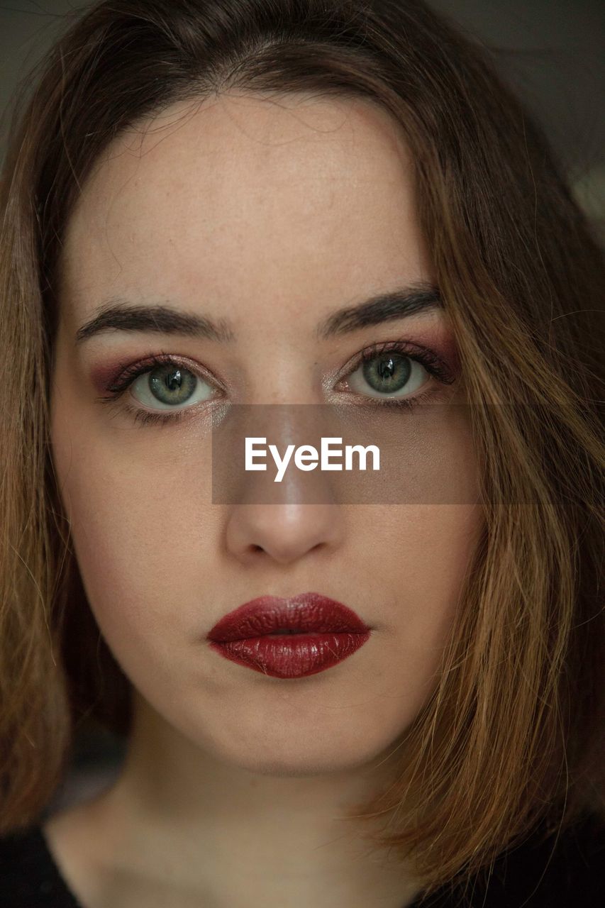 Close-up portrait of beautiful young woman