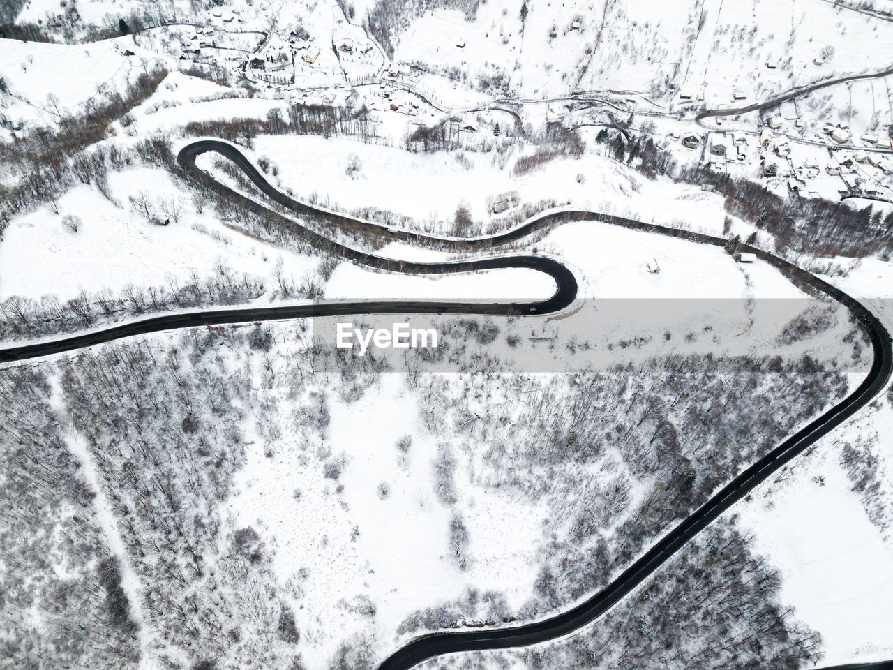 High angle view of snow covered car