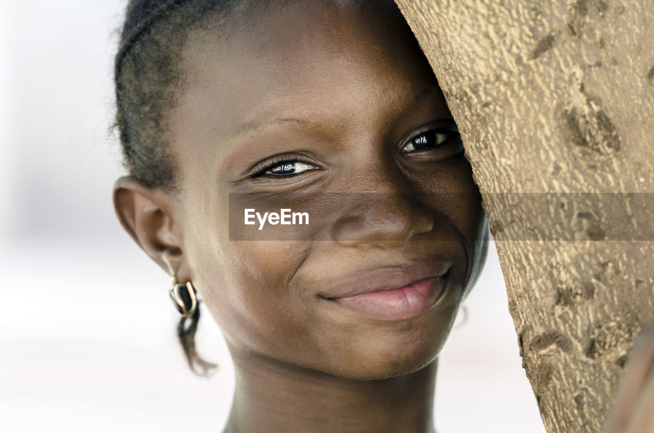 Close-up portrait of a smiling girl