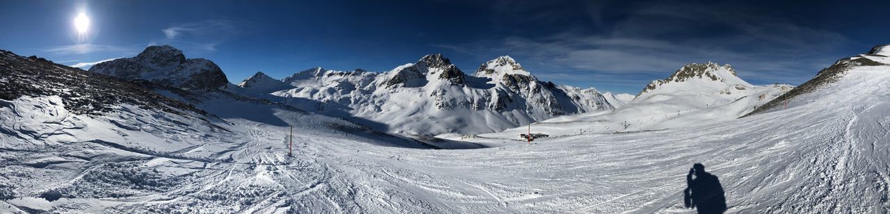 SNOWCAPPED MOUNTAINS AGAINST SKY