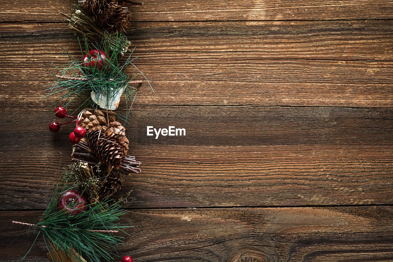 Close-up of christmas decoration on wooden table