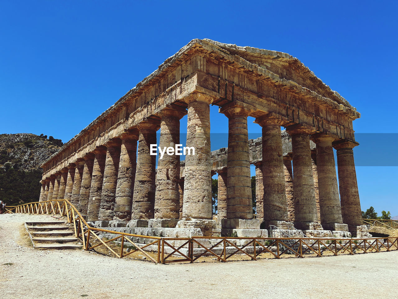 low angle view of historical building against clear blue sky