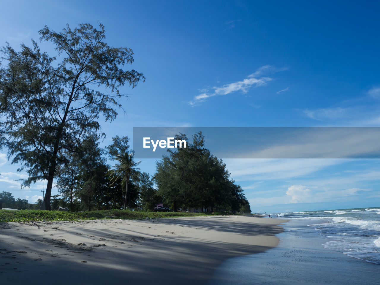 Scenic view of sea against blue sky