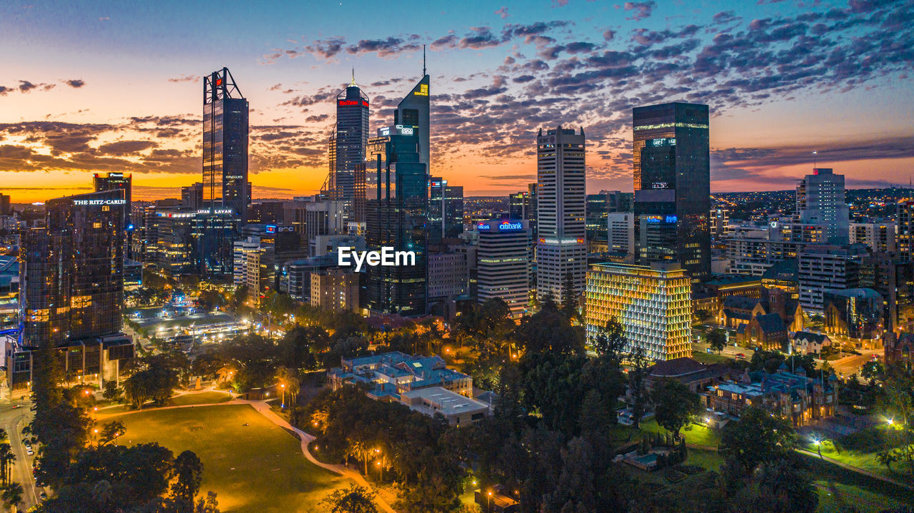 CITYSCAPE AGAINST SKY DURING SUNSET