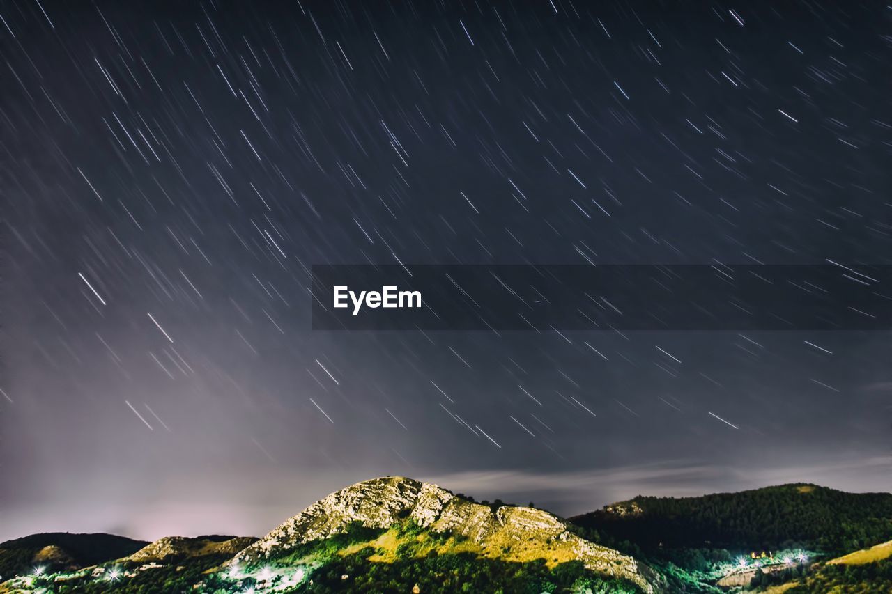 Low angle view of star field against sky at night