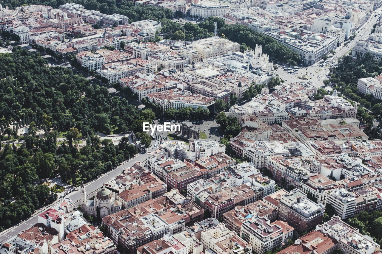 From above aerial drone view shot of city with dense infrastructure in madrid, spain
