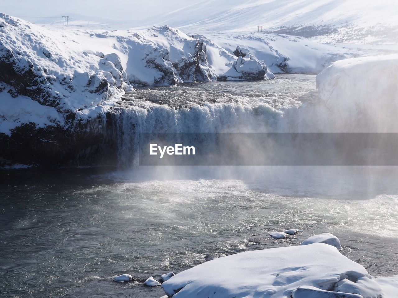 Scenic view of godafoss waterfall during winter