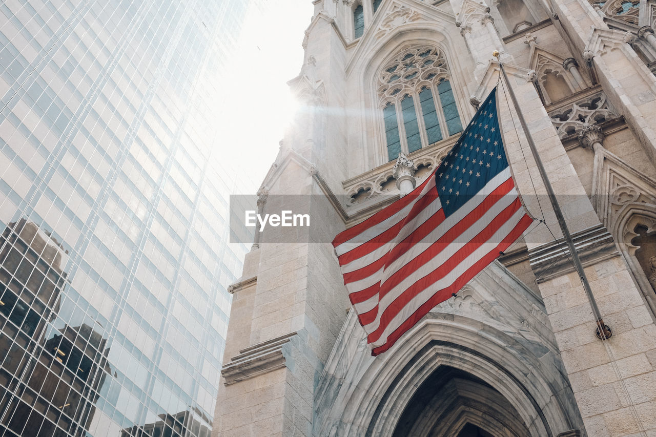 Low angle view of american flags on building