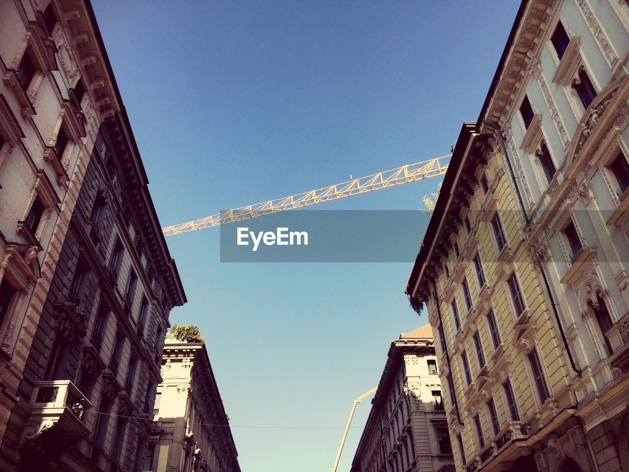 Low angle view of buildings against clear sky