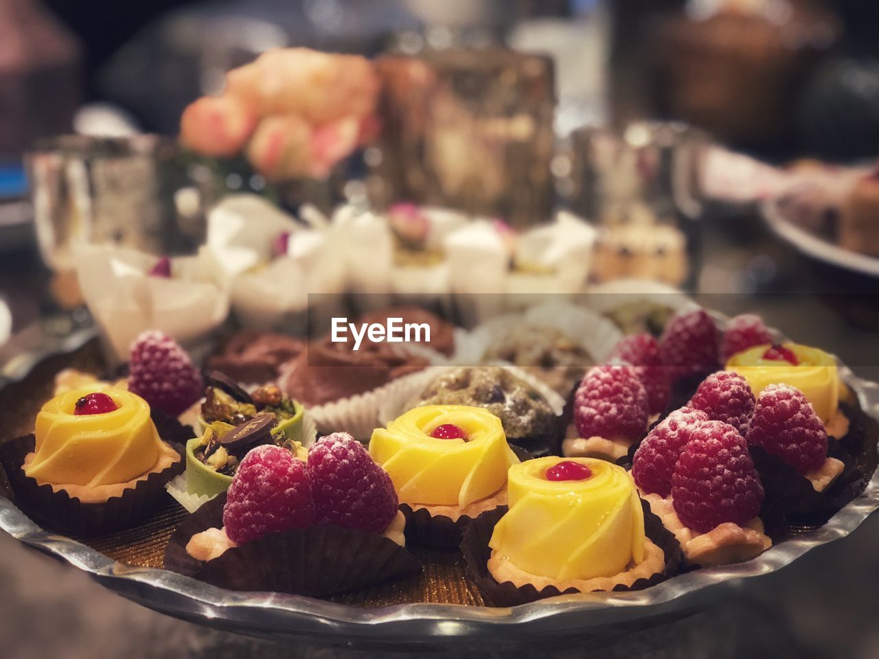 CLOSE-UP OF FRUITS IN PLATE WITH STRAWBERRIES