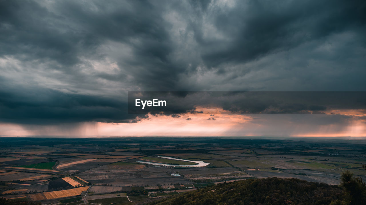 Aerial view of storm clouds over landscape