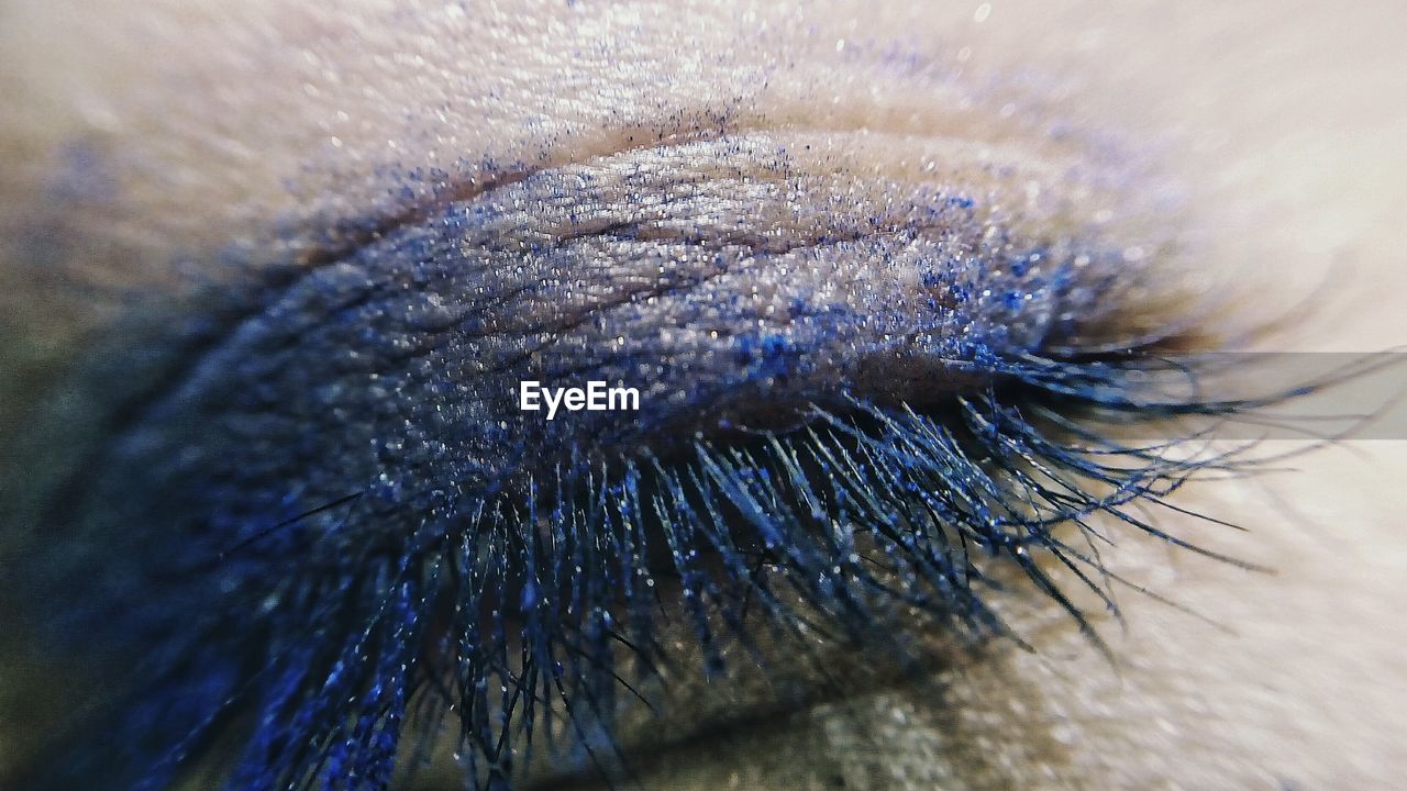 Macro shot of close eye with makeup