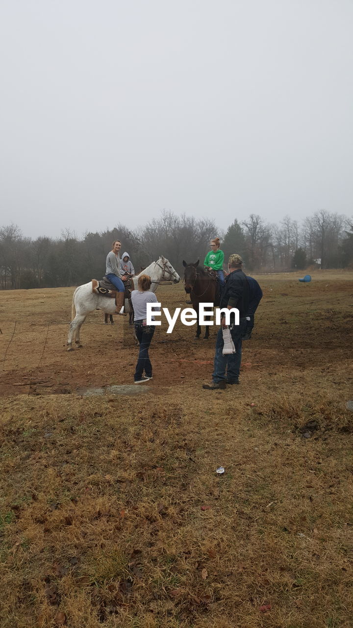 PEOPLE WORKING ON FARM