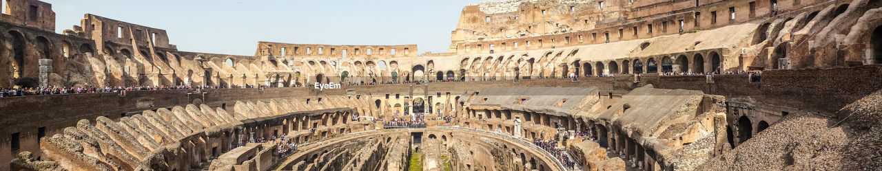 Ultra wide view of the internal of the colosseum in rome