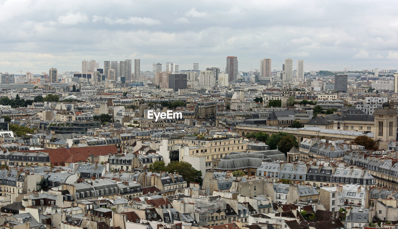 Panorama of paris from the eiffel tower with the high skyscrapers of the district called la defense