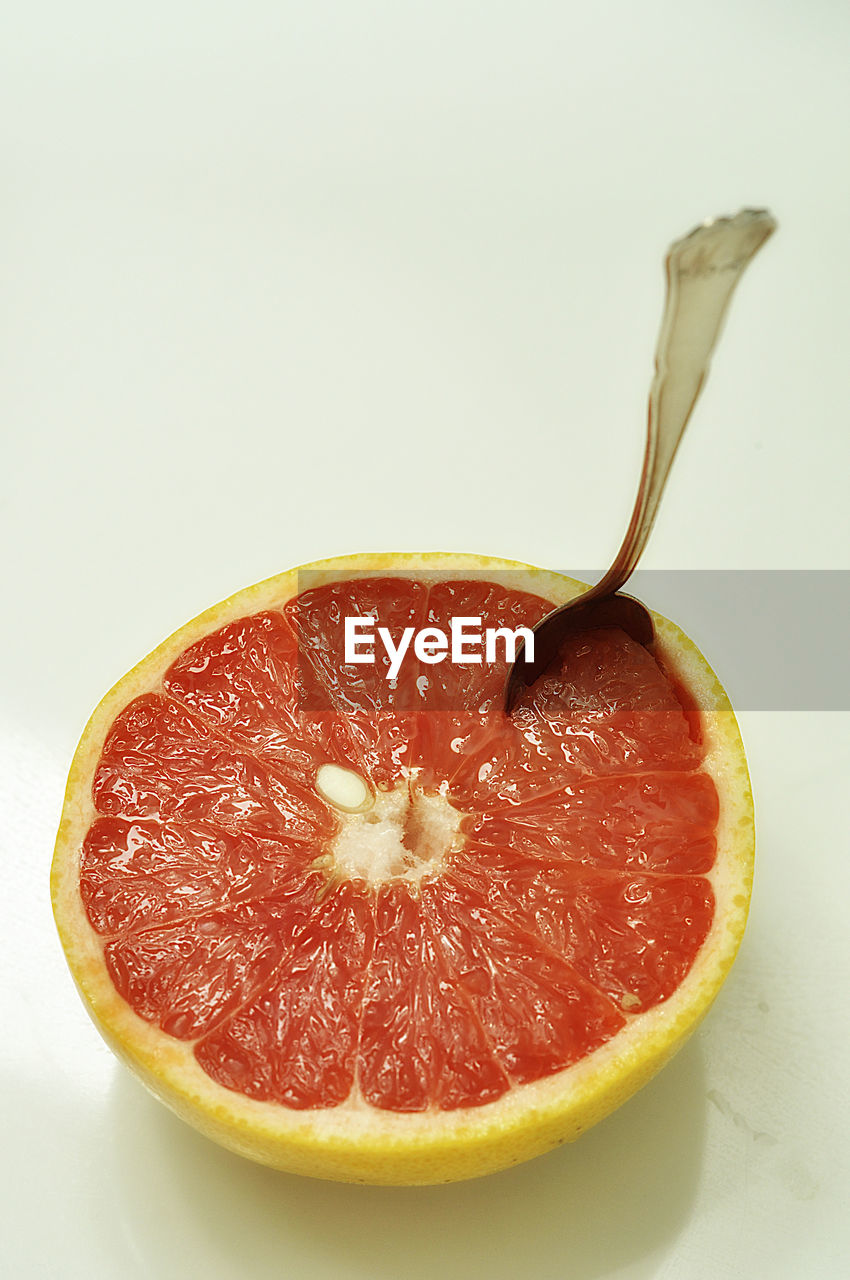 Pink grapefruit half. juicy citrus fruit. healthy lifestyle diet for weight loss. refreshing breggie