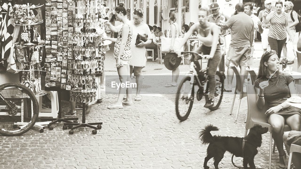 PEOPLE WALKING ON STREET