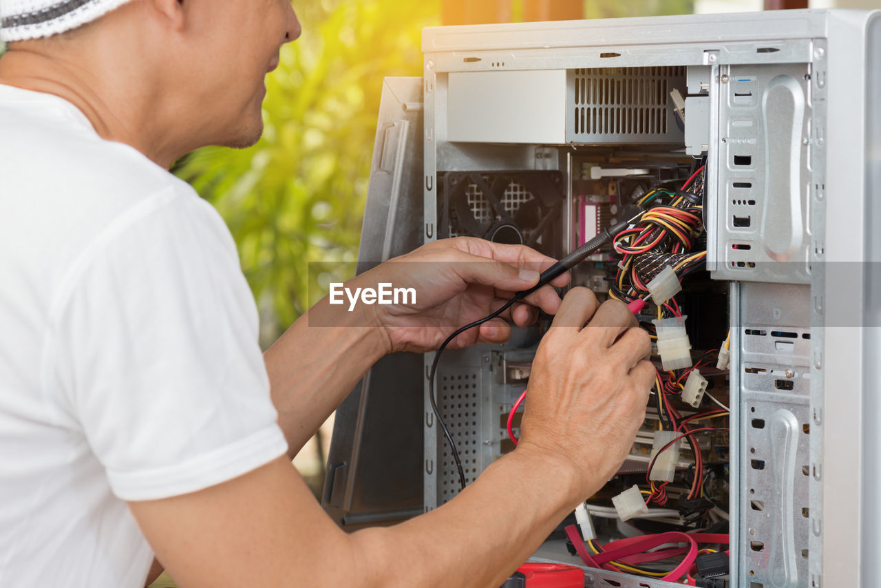 Man repairing computer