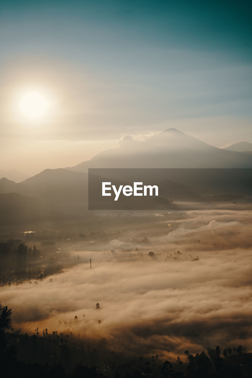 Scenic view of landscape against sky during sunset