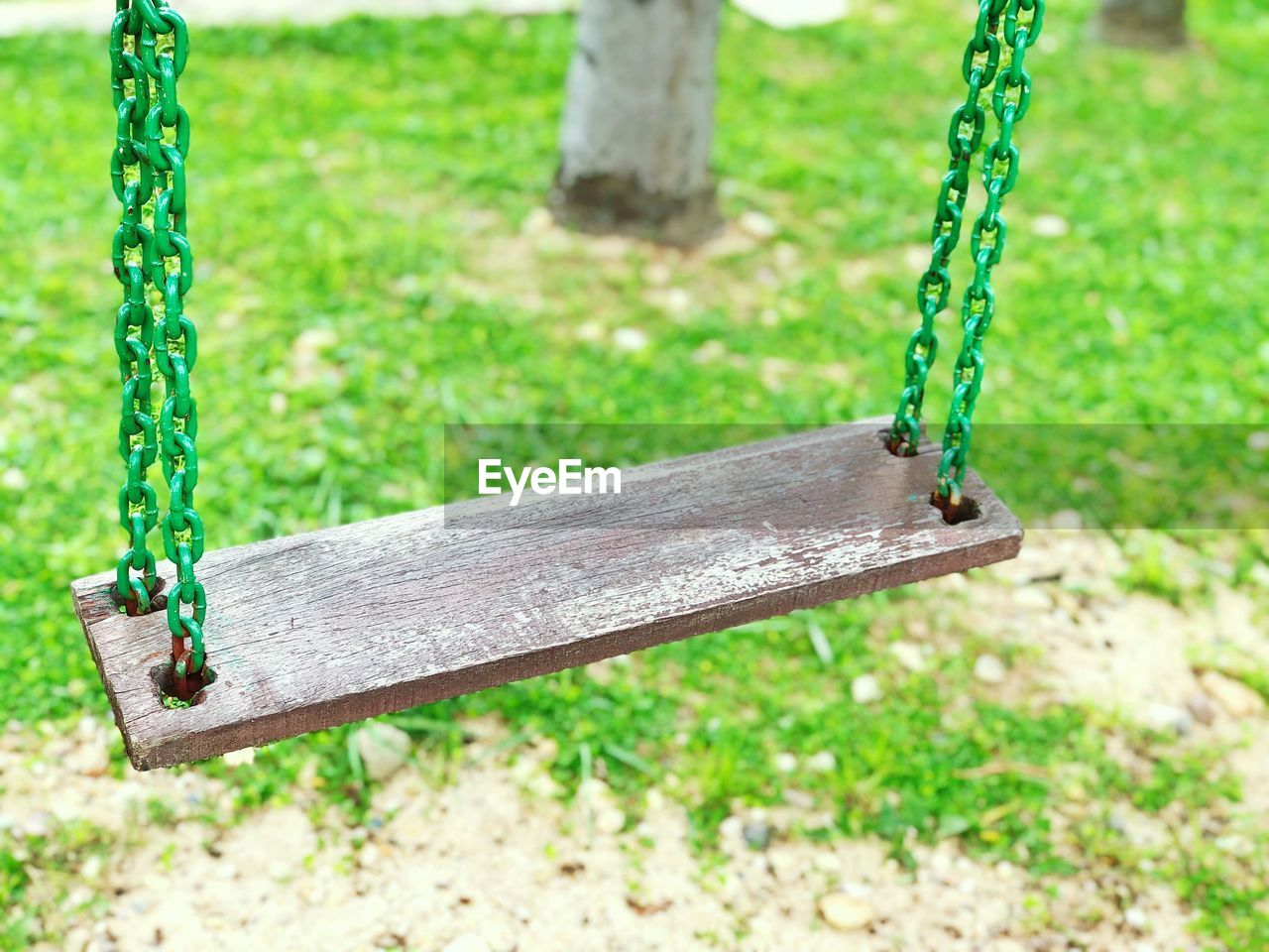 CLOSE-UP OF EMPTY SWING