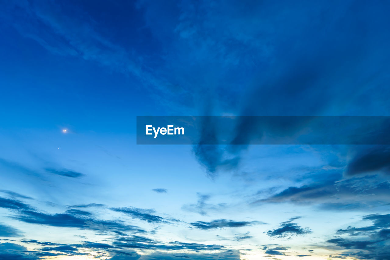 sky, cloud, horizon, environment, blue, dramatic sky, beauty in nature, scenics - nature, nature, landscape, cloudscape, no people, sunset, sunlight, dawn, tranquility, outdoors, moody sky, mountain, twilight, tranquil scene, light - natural phenomenon, backgrounds, water, storm, awe, winter, idyllic, snow, land