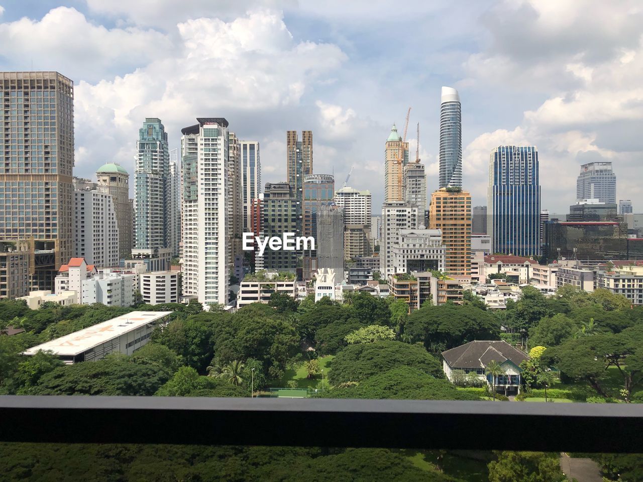 Modern buildings in city against sky