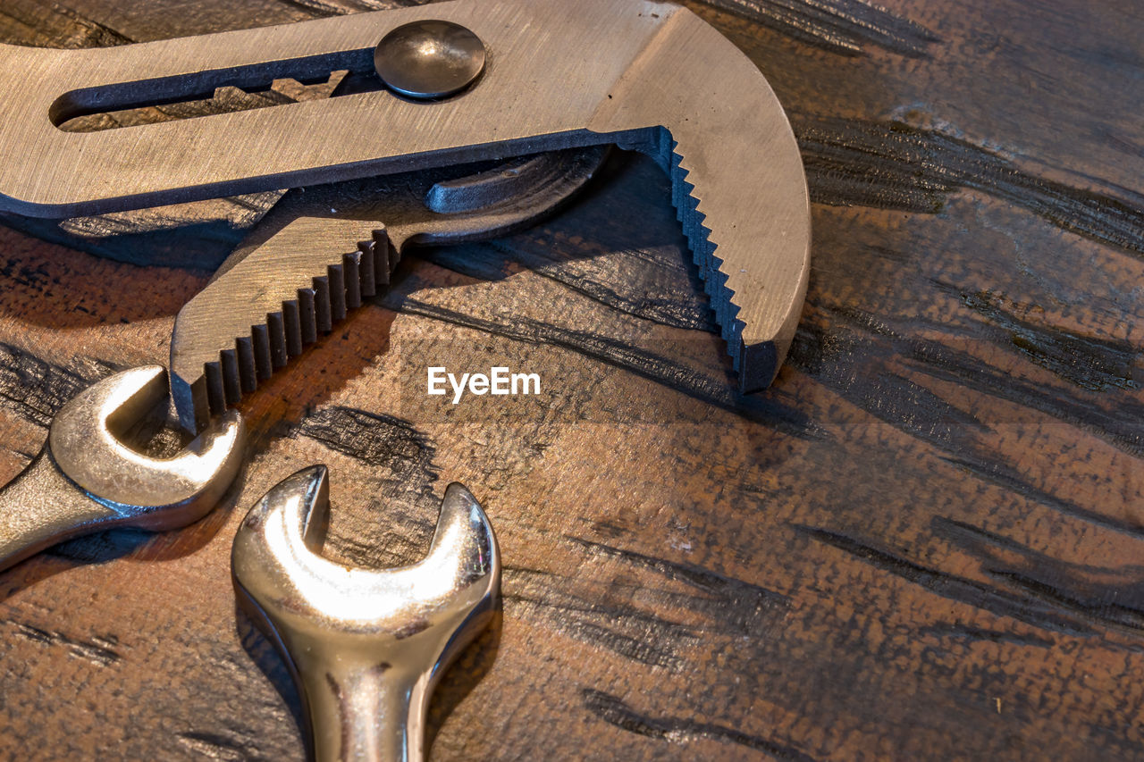 Directly above shot of work tools on wooden table