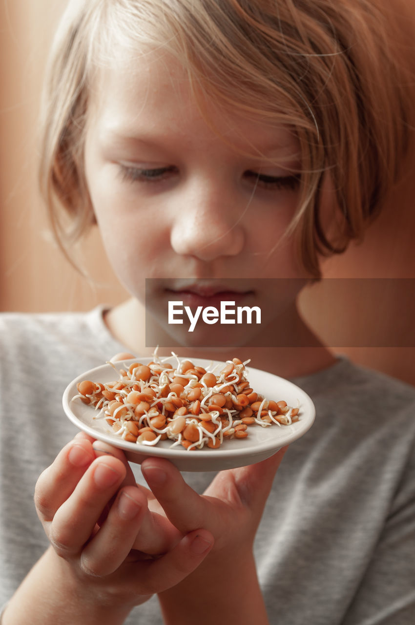 Close-up of girl holding ice cream