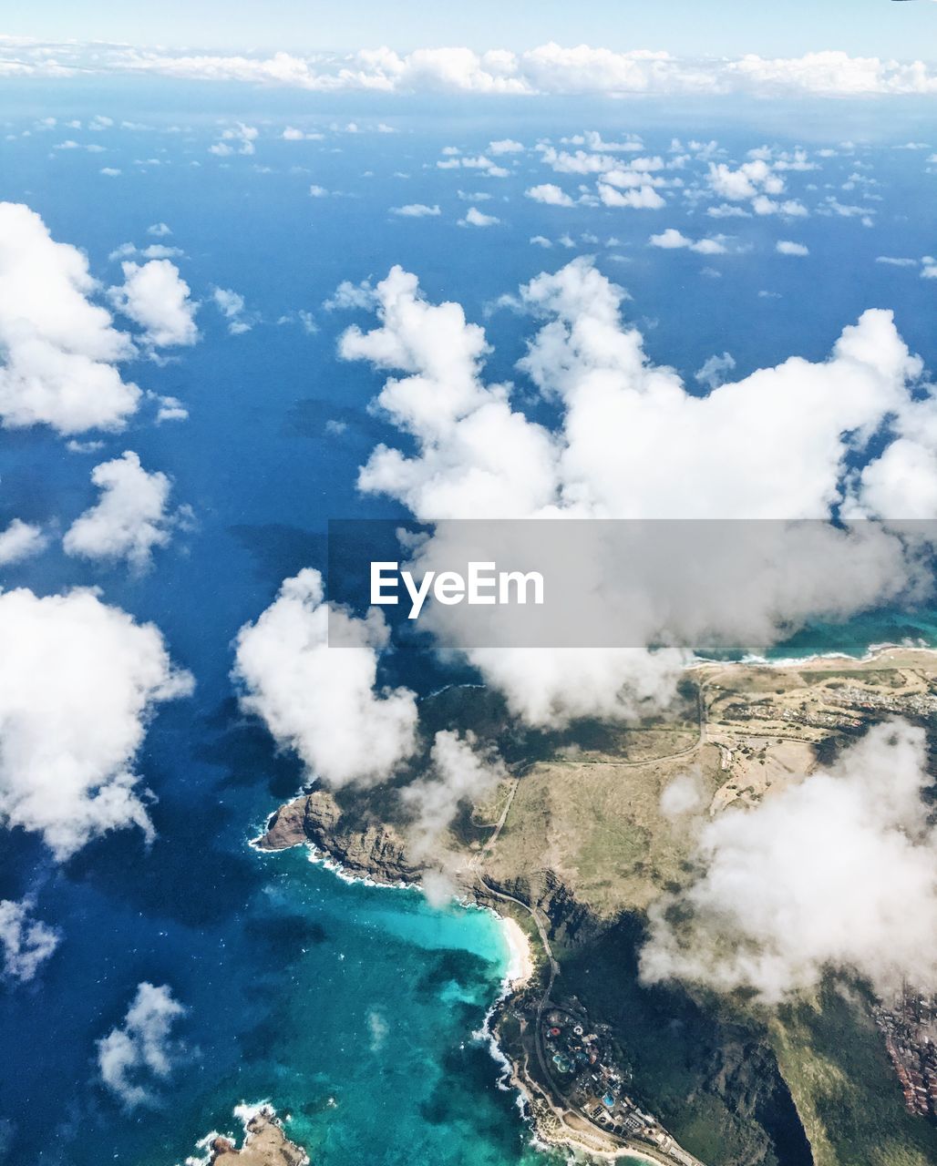 AERIAL VIEW OF CLOUDS OVER SEA AGAINST SKY