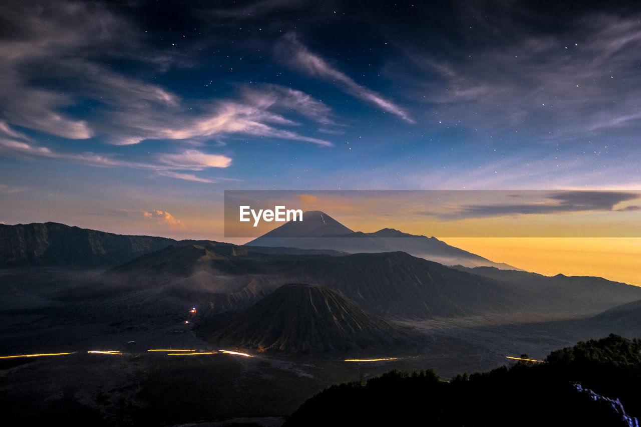 Idyllic view of mt bromo and mt semeru against sky at dusk