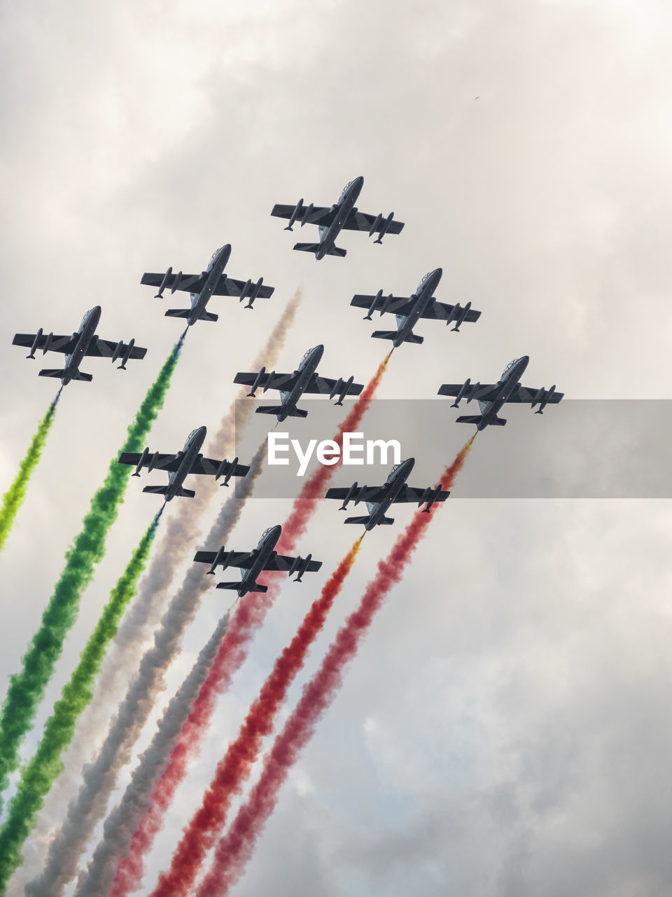 Frecce tricolori, the aerobatic demonstration team of air force, flies and paints the italian flag