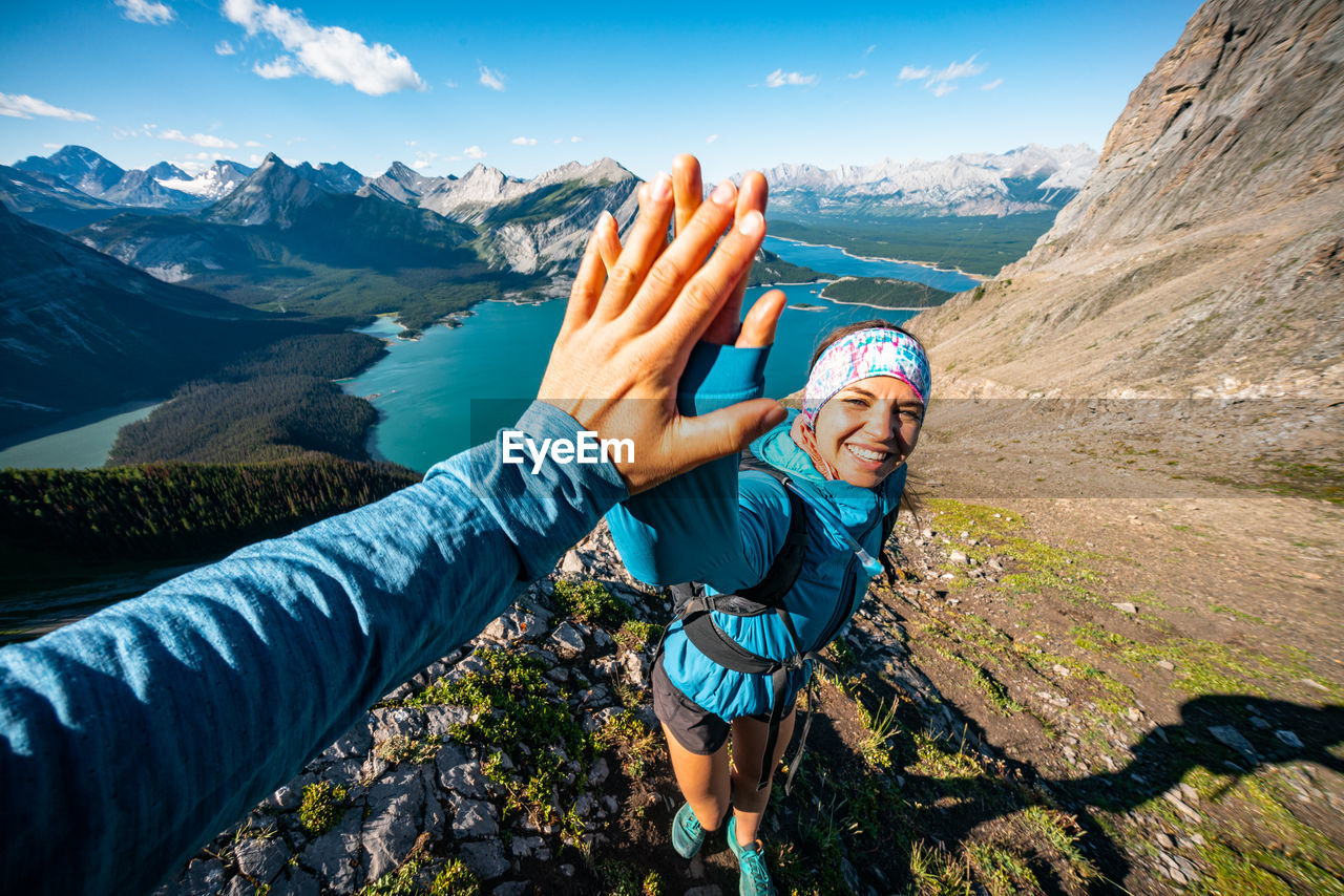 High five on sarrail ridge summit in kananaskis country alberta