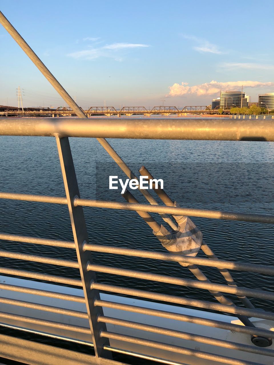 SCENIC VIEW OF SEA BY BRIDGE AGAINST SKY