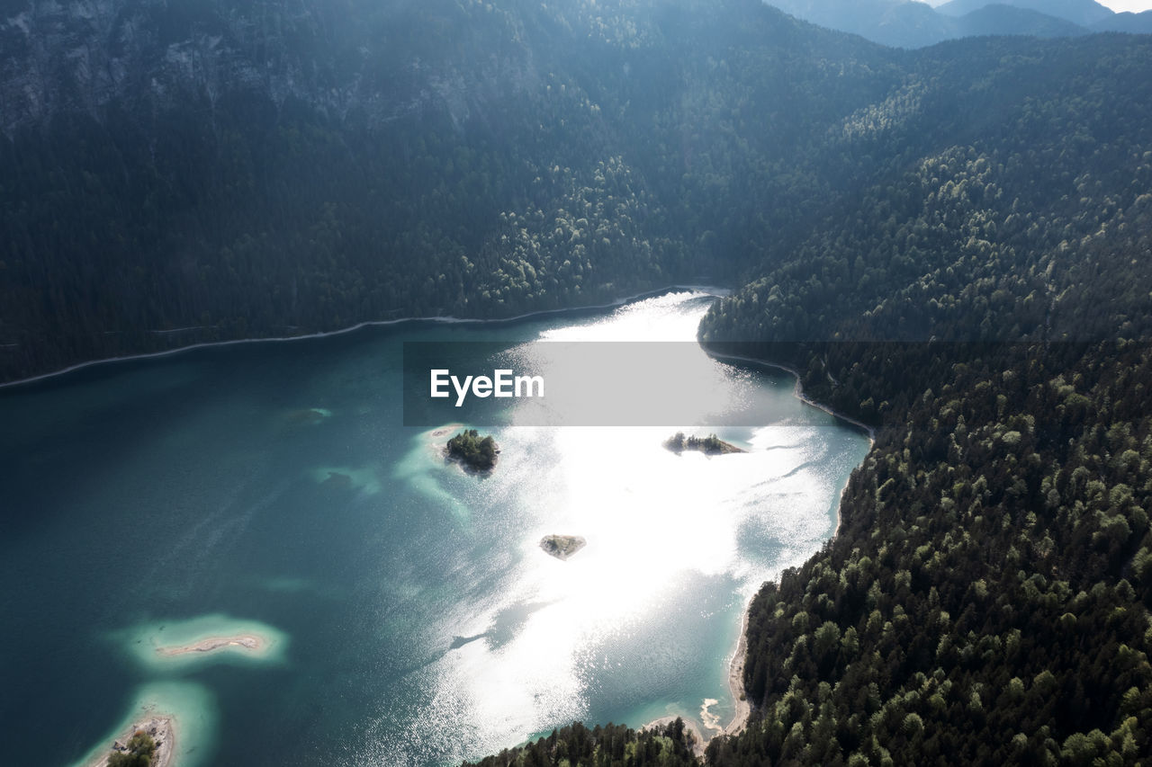 high angle view of sea against mountain