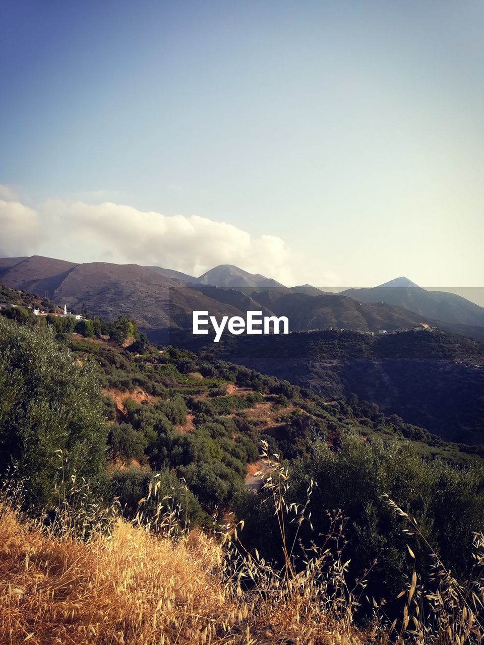 SCENIC VIEW OF LANDSCAPE AND MOUNTAINS