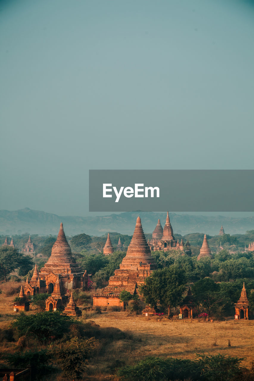 VIEW OF TEMPLE ON LANDSCAPE