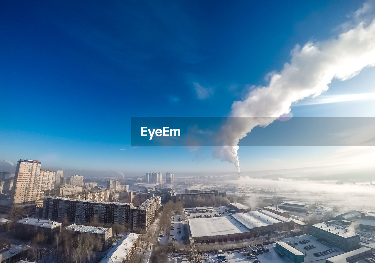 Aerial view of perm against sky during cold winter