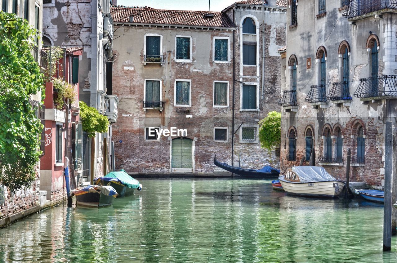 Grand canal amidst buildings