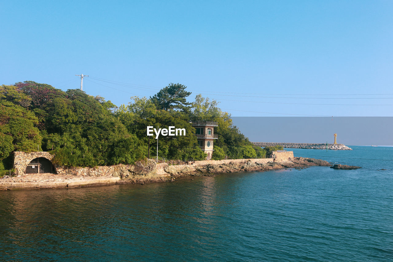 Scenic view of sea against clear sky