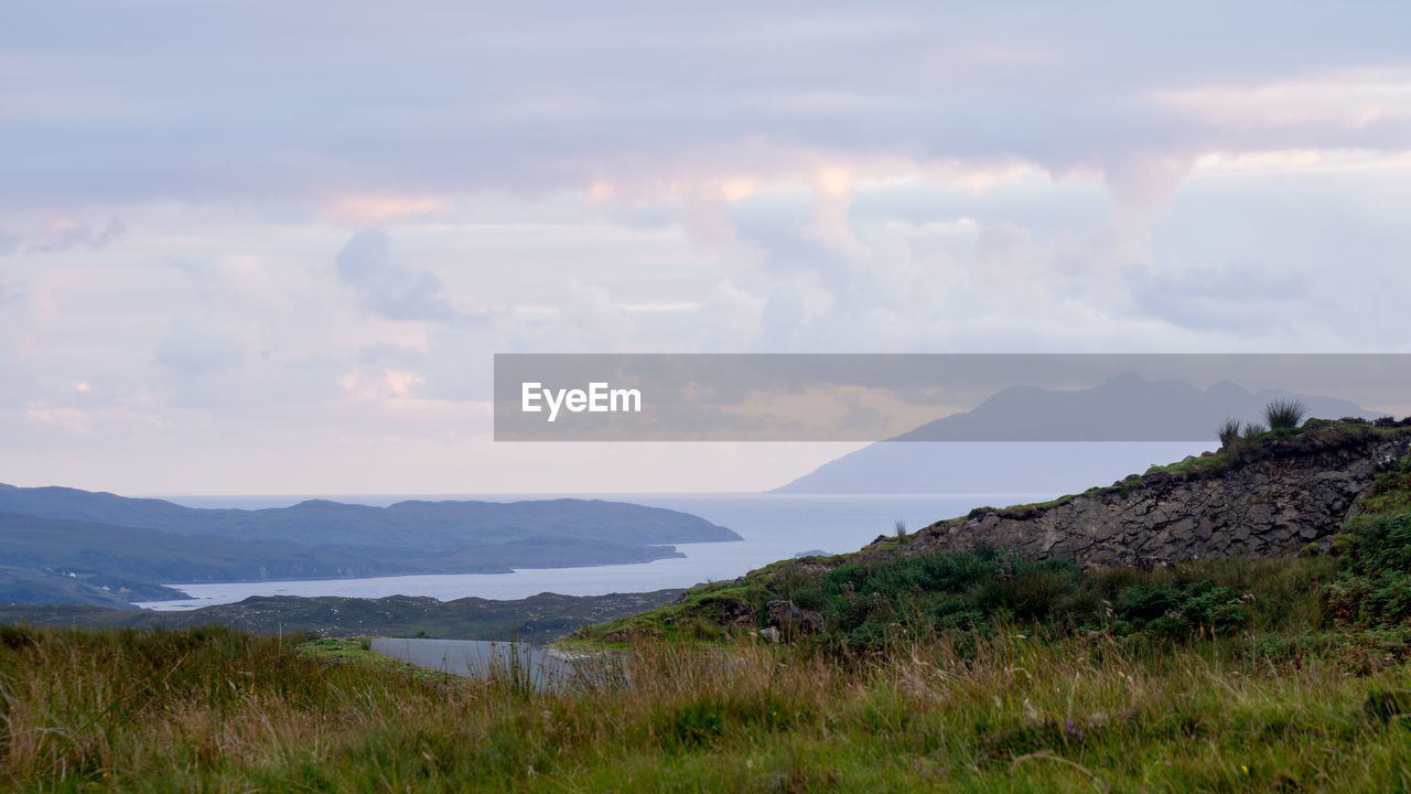 Sunset view of the isle of rum and loch eishort from the hills around heaste on the isle of skye