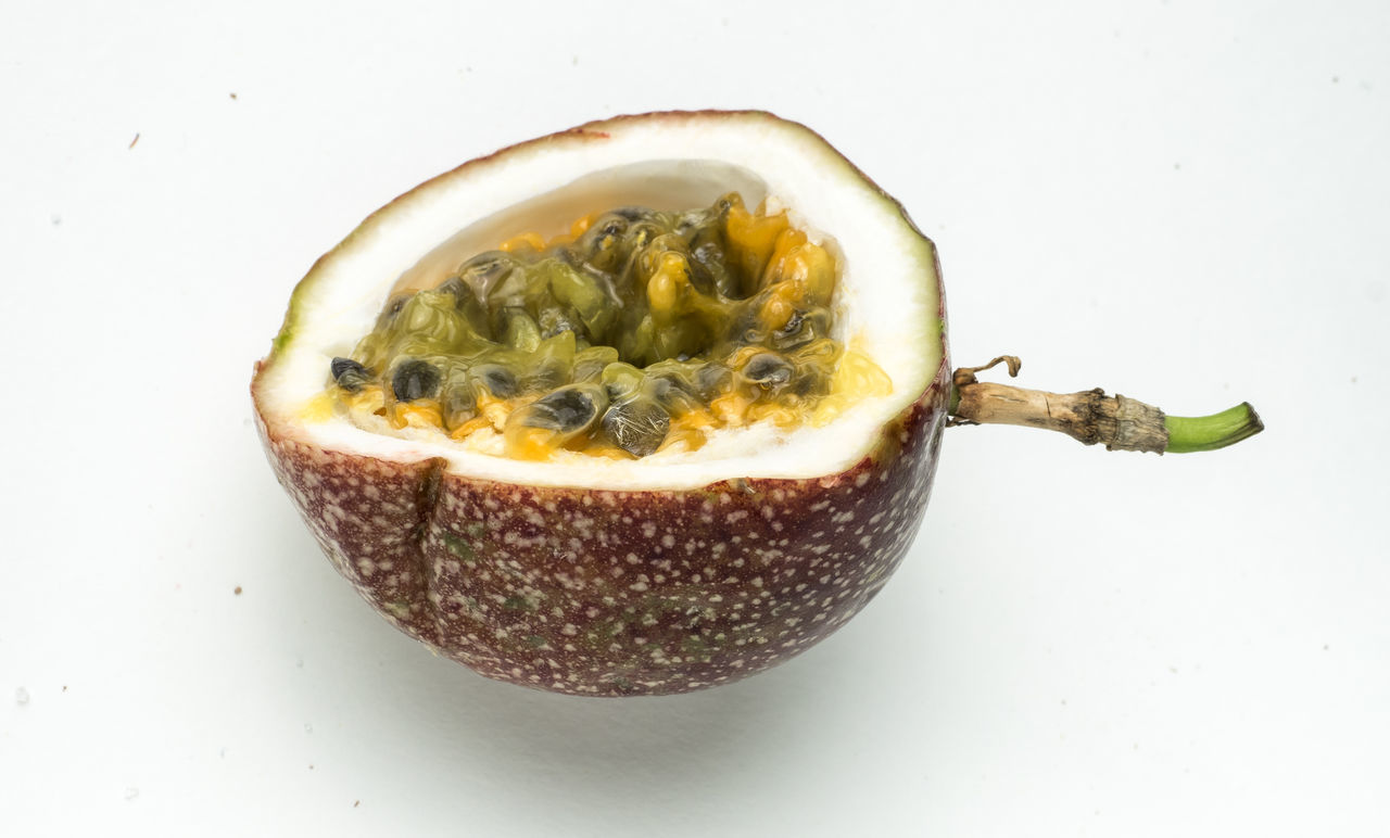 Close-up of passion fruit on table