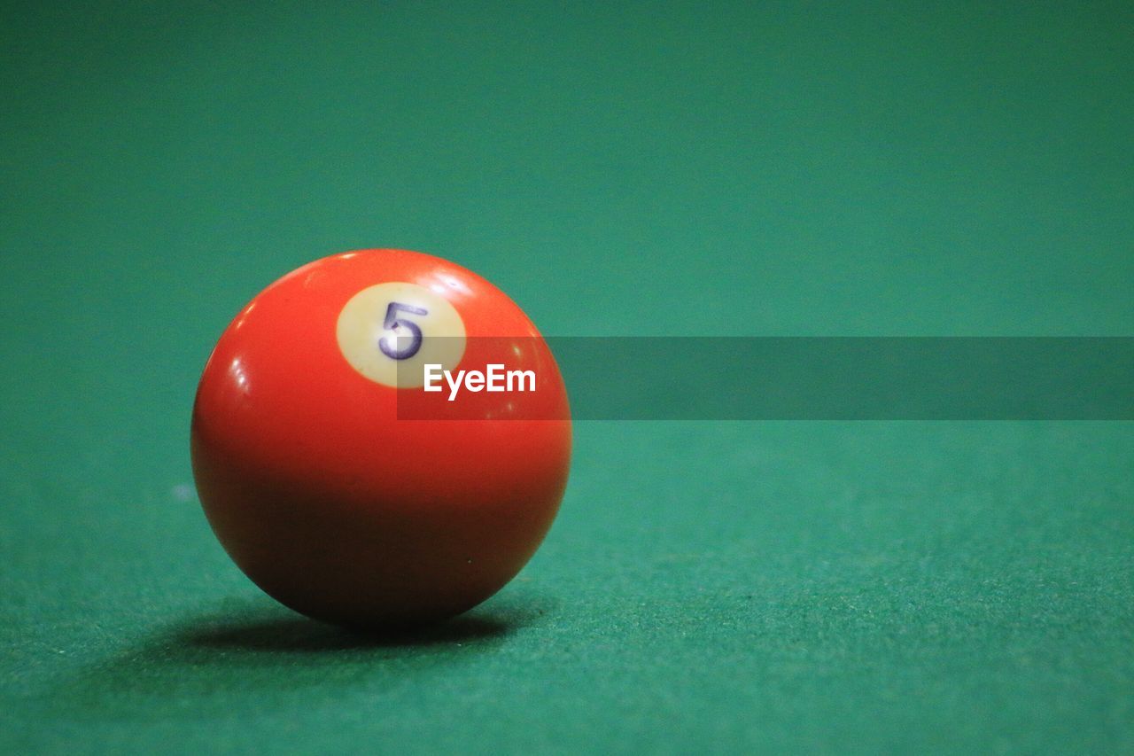 Close-up of ball on pool table