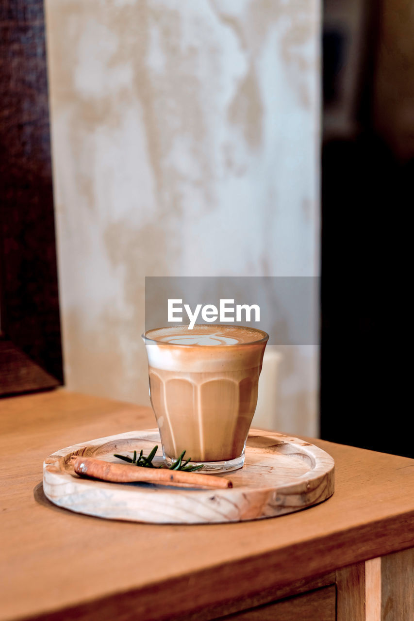 Coffee cup on table in cafe