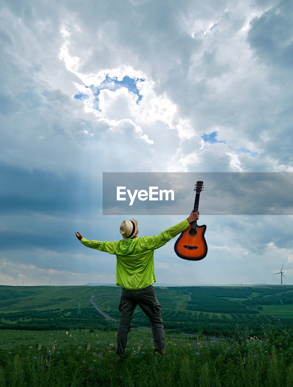 Full length of man on field against sky