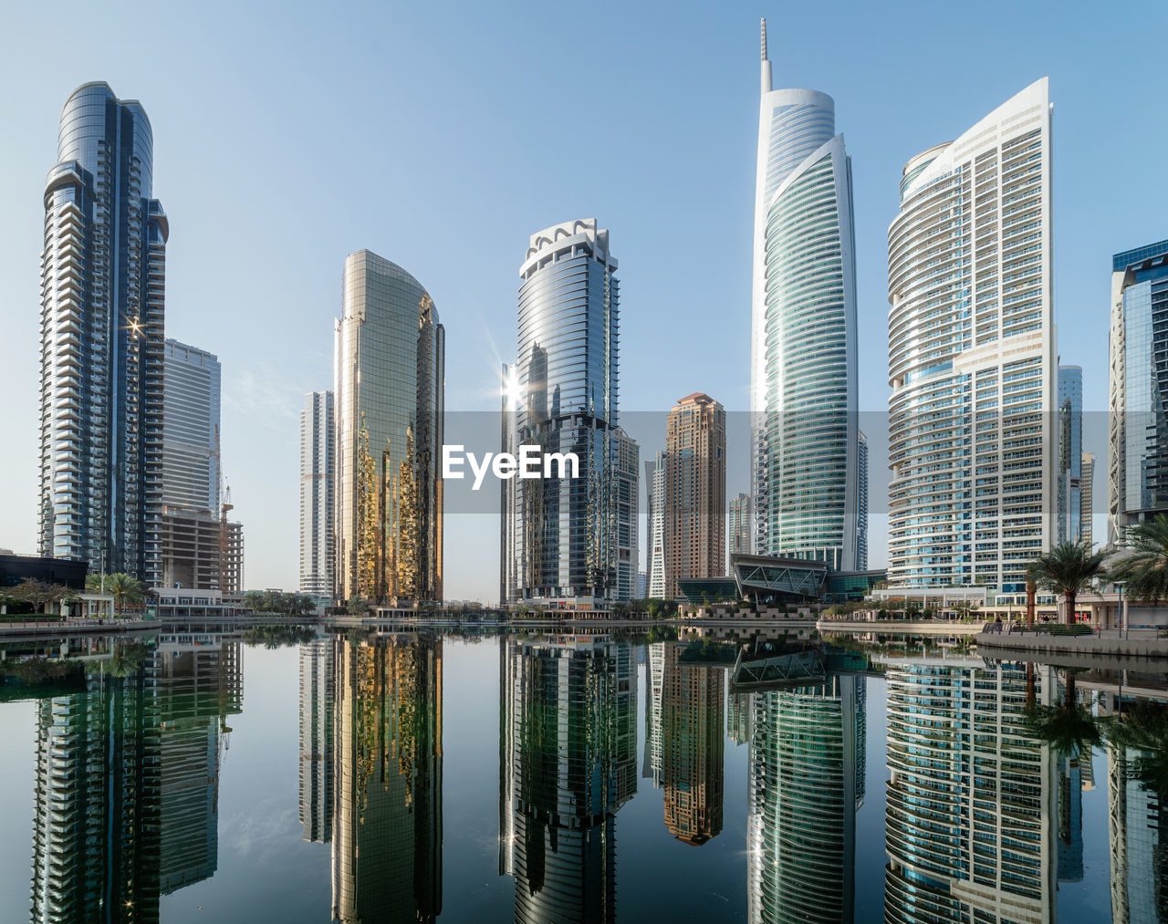 reflection of modern buildings in water