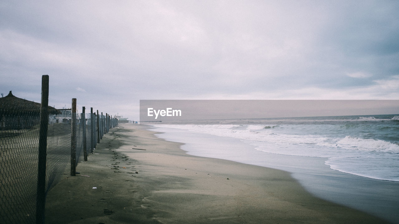 Scenic view of beach against sky