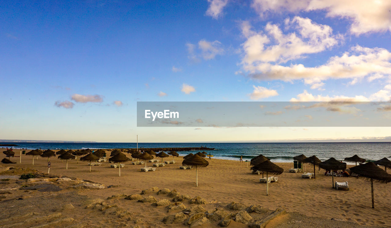 PANORAMIC SHOT OF BEACH AGAINST SKY