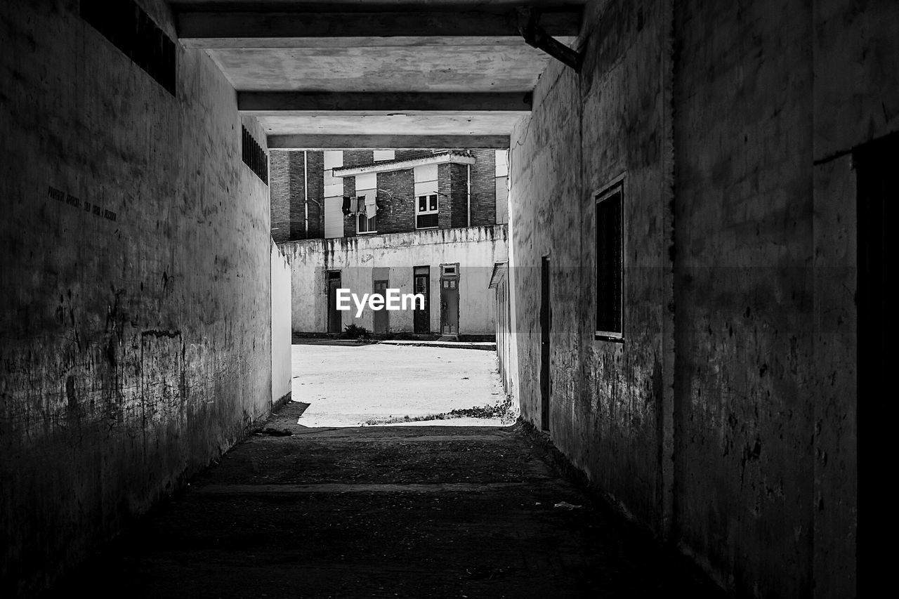 Narrow alley along buildings