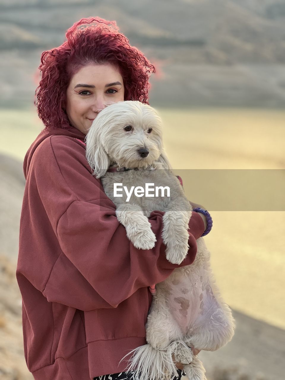 Portrait of woman with dog