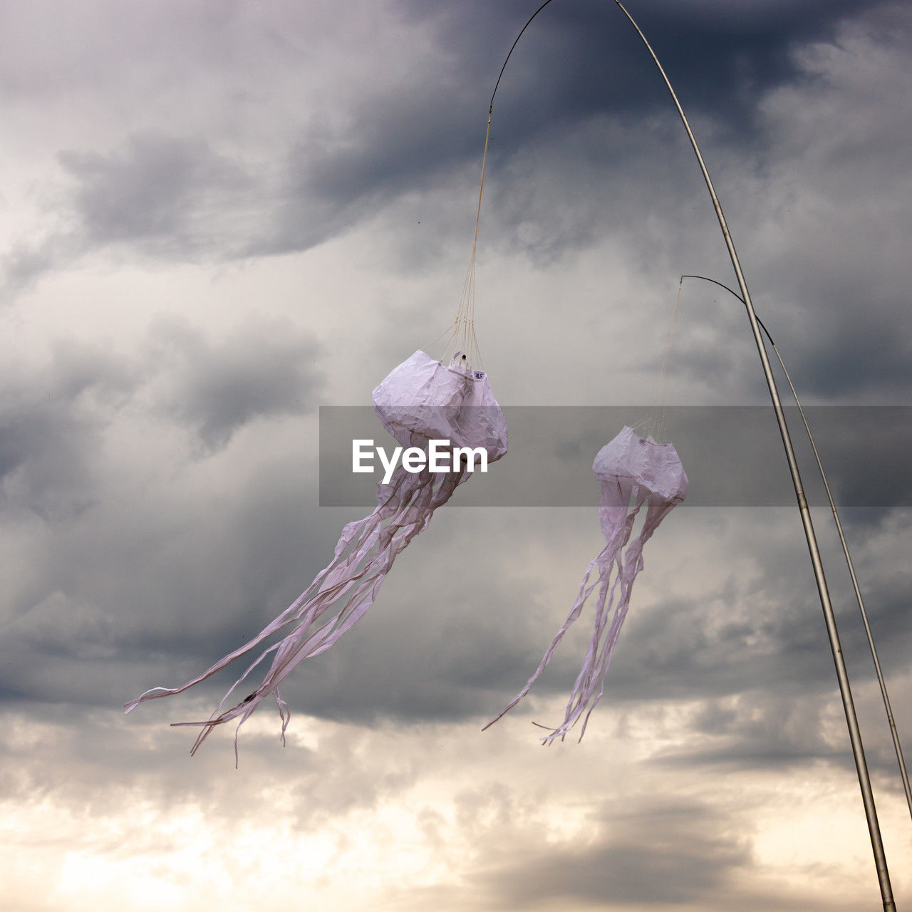 cloud, sky, nature, wind, no people, hanging, outdoors, rope, flying, environment, storm, low angle view, cloudscape, day